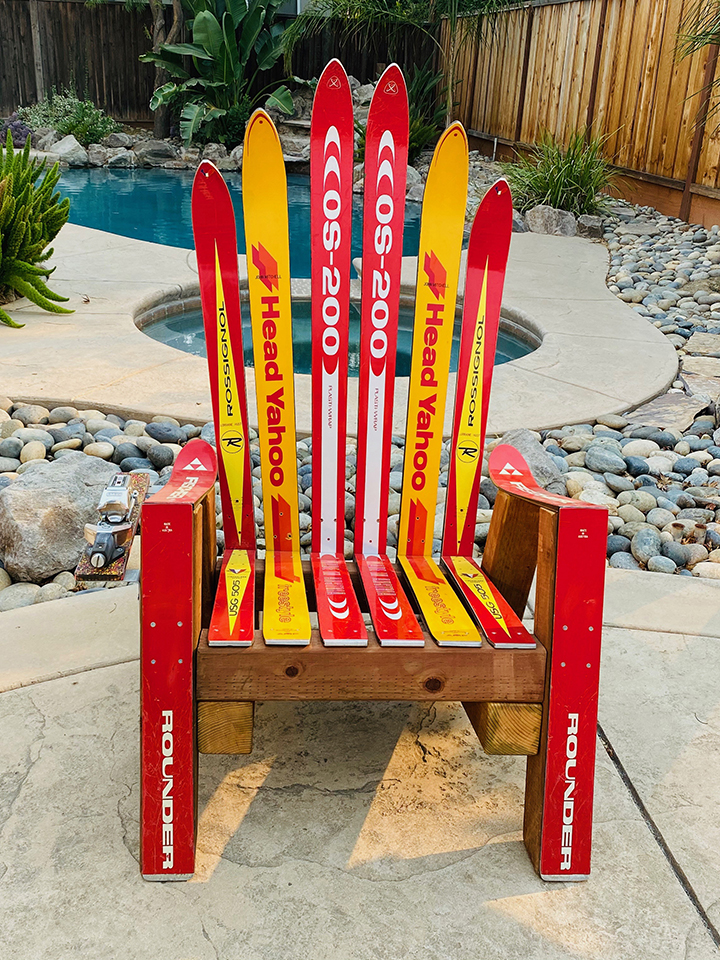  instock red and yellow ski chair made with recycled snow skis
